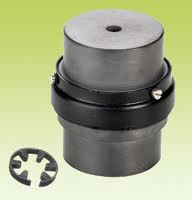An assembled snap wrap coupling, with the split flexible element that wraps between its two hubs lying beside it. An assembled snap wrap coupling, with the split flexible element that wraps between its two hubs lying beside it.