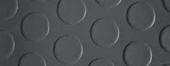 Anti skid rubber flooring with round studs raised across its surface. Anti skid rubber flooring with round studs raised across its surface.