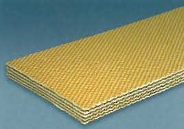 A cut sheet of cotton hard duck transmission belting, the yellow duck plies stepped at the edge. A cut sheet of cotton hard duck transmission belting, the yellow duck plies stepped at the edge.