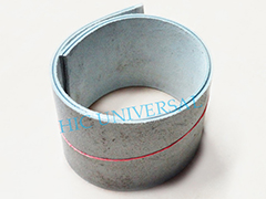 A coil of leather nylon transmission belting standing on end. A coil of leather nylon transmission belting standing on end.