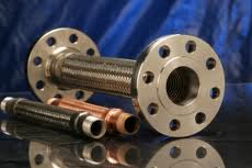 Two steel corrugated hose assemblies, one with a drilled flange and one with a threaded fitting. Two steel corrugated hose assemblies, one with a drilled flange and one with a threaded fitting.