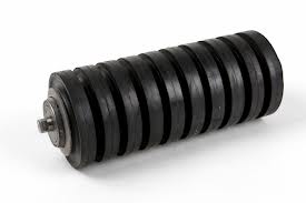 An impact idler, rubber rings packed along the length of its steel tube. An impact idler, rubber rings packed along the length of its steel tube.