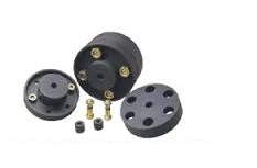 A pin bush coupling opened up, showing the drilled flange, its pins and the rubber bushes they carry. A pin bush coupling opened up, showing the drilled flange, its pins and the rubber bushes they carry.