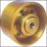 A brake drum coupling, the machined drum face outward and the bolt holes around its flange. A brake drum coupling, the machined drum face outward and the bolt holes around its flange.