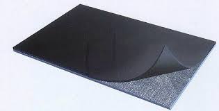 A sheet of insertion ply rubber with one corner turned back to show the fabric inside. A sheet of insertion ply rubber with one corner turned back to show the fabric inside.