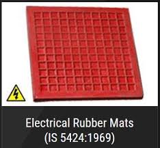A red electrical rubber mat with a square grid pattern, labelled Electrical Rubber Mats, IS 5424:1969, beside a high voltage warning symbol.