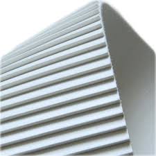 The underside of a white belt, ribbed in a fine saw tooth profile along its length. The underside of a white belt, ribbed in a fine saw tooth profile along its length.