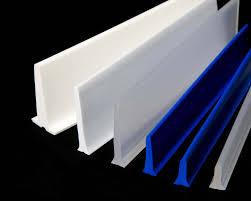 Cleat and flight profiles in white and blue, standing together to show the shapes they are made in. Cleat and flight profiles in white and blue, standing together to show the shapes they are made in.